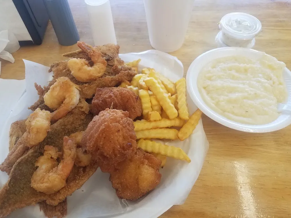 12 Pieces Shrimp 2 Catfish Fillets 2 Sides and a Tea